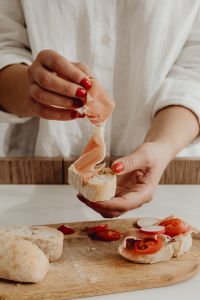Making Bruschetta with Prosciutto, Tomatoes and Radishes