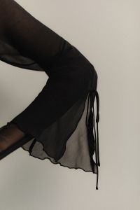 Kaboompics - Close-Up Sheer Black Sleeve and Skirt Detail