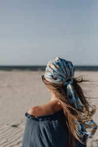 Kaboompics - Windblown Hair with Floral Headscarf at the Beach