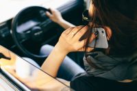 Kaboompics - Woman Talking on the Phone in the Car
