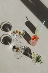Kaboompics - Clear Lime Cocktail with Rosemary on a Round Table