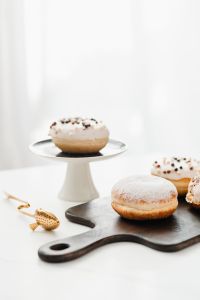 Kaboompics - Homemade Raspberry Polish Paczki Donut with Powdered Sugar