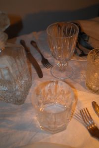 Kaboompics - Crystal Goblet and Glassware on Candlelit Table