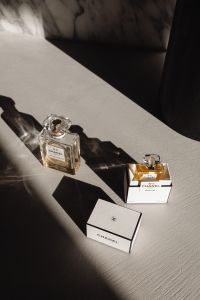 Kaboompics - Chanel No. 5 Perfume Bottles and Packaging in Sunlight