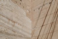 Kaboompics - Weathered Limestone Wall Texture with Strong Shadow Lines