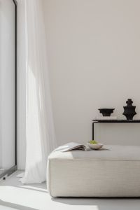 Kaboompics - Modern Beige Living Room with Sheer Curtains and Reading Props