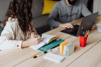 Kaboompics - Woman and Man Working Together at Wooden Desk