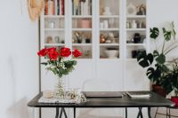 Kaboompics - Red Rose Vase with Laptop and Phone on Dark Desk, Home Office Styling