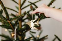 Kaboompics - Wooden Bird Ornament Hanging on Christmas Tree