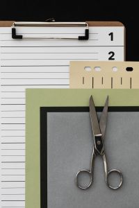 Kaboompics - Creative Graphic Design Flat Lay with Scissors Paper Clip and Layered Paper