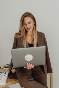 Kaboompics - Female Design Entrepreneur With Laptop in Studio