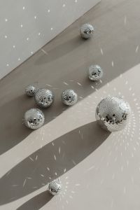 Kaboompics - Scattered Disco Balls with Angular Light and Shadows Across the Floor