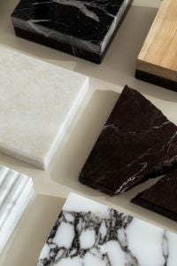 Kaboompics - Black Marble, White Stone and Wood Material Swatches on Beige Background