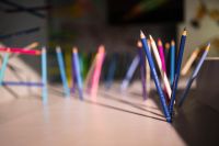 Kaboompics - Pencils and crayons sticking out of the walls and floors
