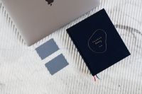 Kaboompics - Minimalist Blue Business Card Mockup with Laptop and Navy Planner on Marble