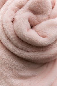 Kaboompics - Rolled Soft Pink Blanket Texture Close Up