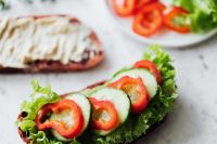 Kaboompics - Hummus Toast and Fresh Vegetable Sandwich on Marble