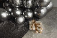 Kaboompics - Silver Christmas Tree with Silver Balloons and Gold Gift
