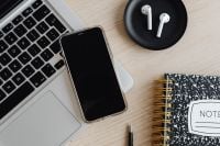 Kaboompics - Laptop, Smartphone, AirPods and Notes Notebook on Desk