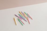 Kaboompics - Pastel Pens on White Desk