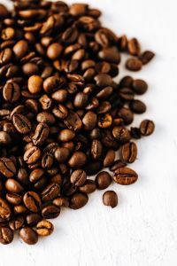 Kaboompics - Coffee Bean Pile on White with Open Space for Packaging and Menu Design