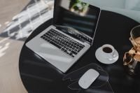 Kaboompics - Laptop, Coffee Cup and Wireless Mouse on Black Table, Minimal Home Office Close-Up