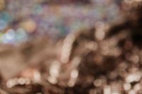Kaboompics - Soft-Focus Rose Gold Sequin Fabric with Pastel Bokeh, Abstract Background