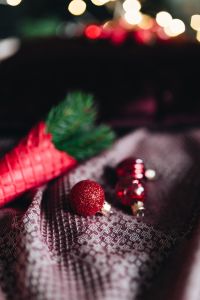 Burgundy Christmas Decorations and Festive Holiday Backgrounds with Red and Silver Ornaments