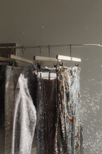 Kaboompics - Silver Sequin Party Dresses on Clothing Rack
