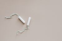 Kaboompics - Two Tampons on Beige Surface in Minimal Period Care Flat Lay