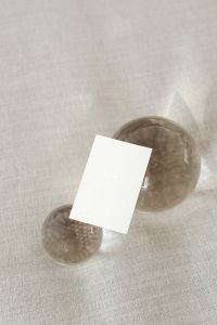 Kaboompics - Angled Business Card Mockup with Tinted Glass Spheres
