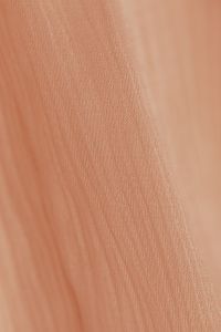 Kaboompics - Peach Fabric with Diagonal Ridges