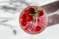 Kaboompics - Raspberry Soda With Ice And Rosemary Top View