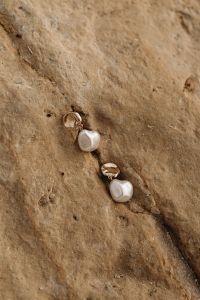 Minimalist Jewelry on Malta's Rocky Beach