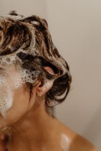 Kaboompics - Woman Washing Hair with Shampoo in the Shower