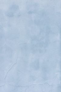 Kaboompics - Pale Blue Cracked Plaster with Horizontal Layers