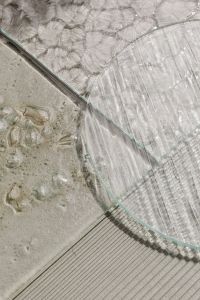 Kaboompics - Overlapping Rounded Glass Panels with Textured Facets