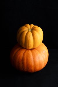 Kaboompics - Yellow Pumpkin Stacked on Orange Pumpkin