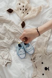 Kaboompics - Blue Baby Shoes on Baby Clothes