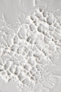 Kaboompics - Structured Cream Texture Pattern Close-Up on Neutral Background
