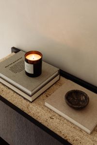 Kaboompics - Black Console with Silver Dome Lamp, Candle and Stone Bowl