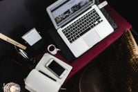 Kaboompics - Overhead Pink Home Office Flat Lay with Laptop, Phone and Notebook