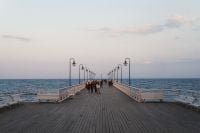 Kaboompics - Wooden Pier Leading into the Sea at Dusk