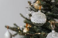 Kaboompics - White Lace Christmas Ornament on Decorated Tree