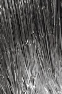 Kaboompics - Silver Tinsel Texture With Metallic Holiday Shine