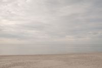 Kaboompics - Misty Empty Beach and Hazy Ocean Horizon