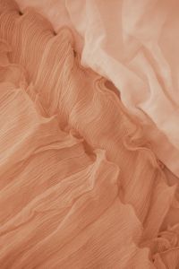 Kaboompics - Peach and White Draped Fabric