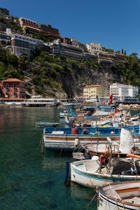 Kaboompics - Boats In Sorrento Harbor Beneath Cliffside Hotels