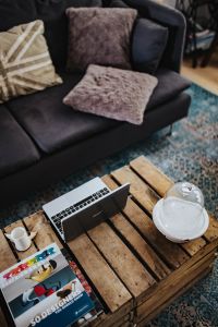 Kaboompics - Designer living room interior with a wooden box table and a light blue carpet
