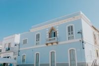 Kaboompics - Pale Blue Historic Building in Calasetta Town Square